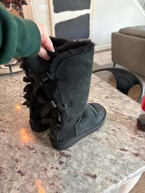 UGG Women's Bailey Bow Tall II Black Sheepskin Suede Boots